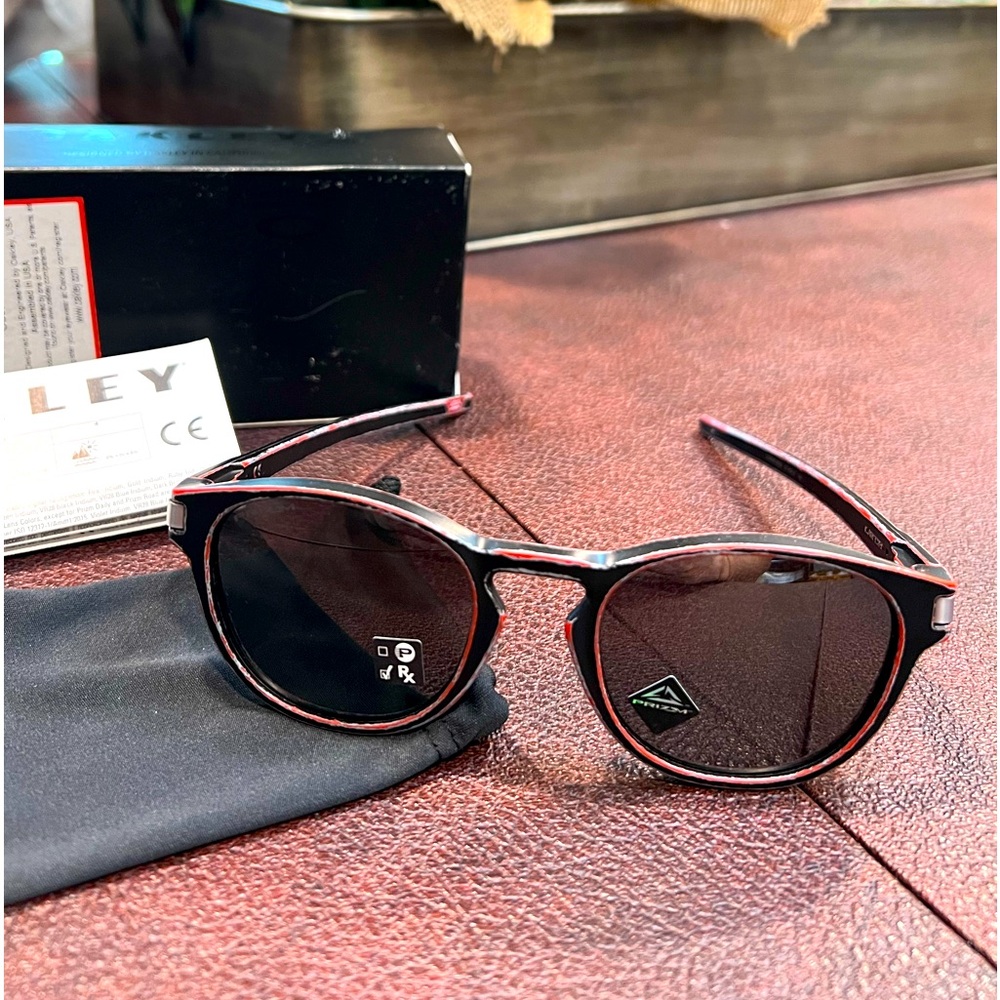New Oakley Custom Black and Res Sunglasses.